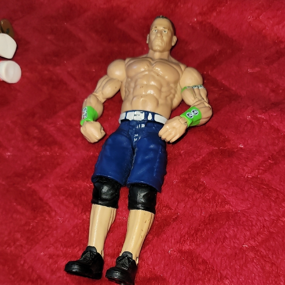 John Cena action figure, specifically the Mattel WWE Elite Coll. version,2013